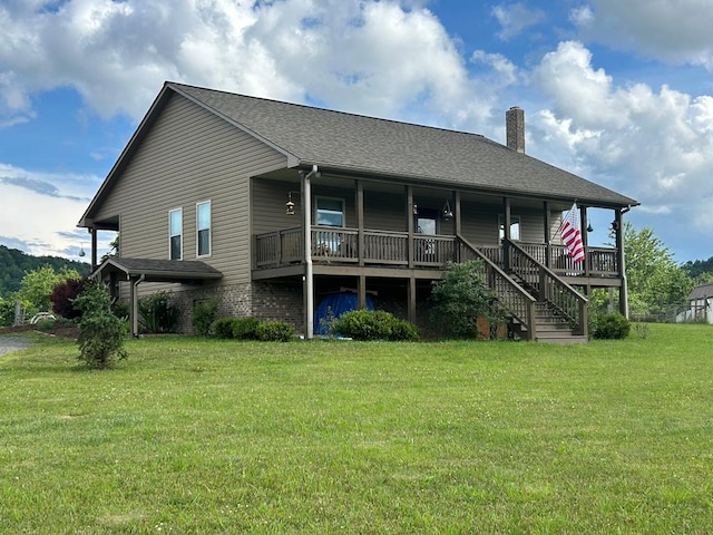 3950 Boyd Rd, Draper, VA 24324 - back of property with a chimney, a lawn, a porch, and a shingled roof