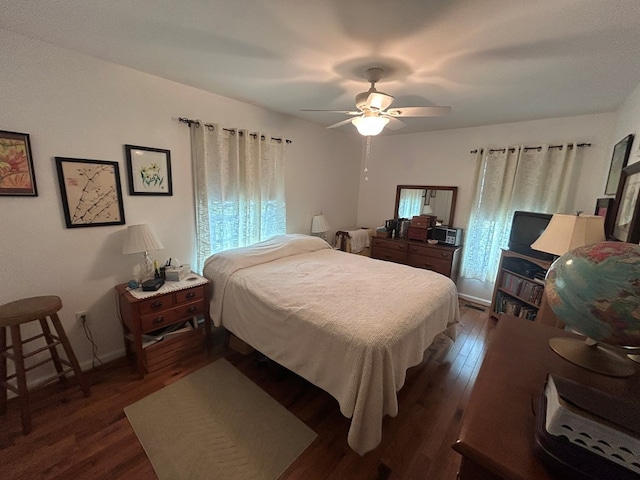 3950 Boyd Rd, Draper, VA 24324 - bedroom with multiple windows, dark wood-style flooring, and ceiling fan