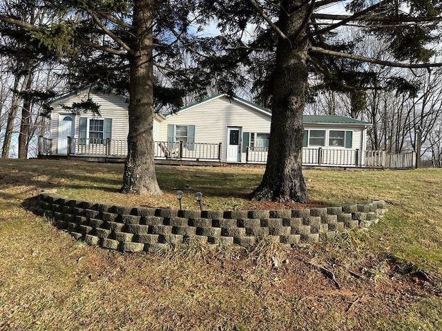 4860 Greasy Creek Rd, Bandy, VA 24602 - ranch-style house featuring a front lawn