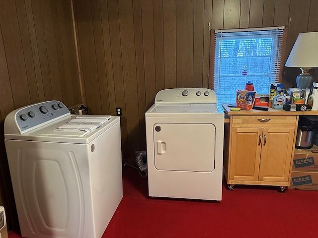 4860 Greasy Creek Rd, Bandy, VA 24602 - laundry area featuring washing machine and clothes dryer, wooden walls, and cabinet space