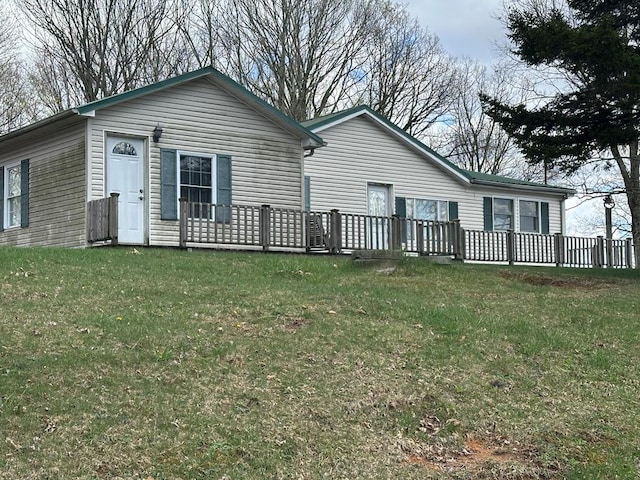 4860 Greasy Creek Rd, Bandy, VA 24602 - rear view of house with a lawn