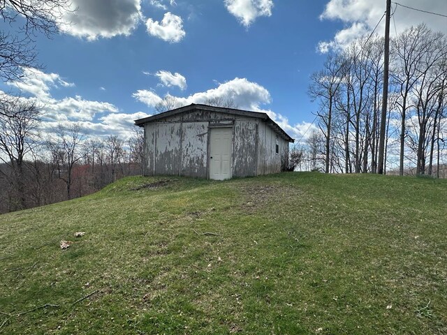 4860 Greasy Creek Rd, Bandy, VA 24602 - view of pole building with a yard