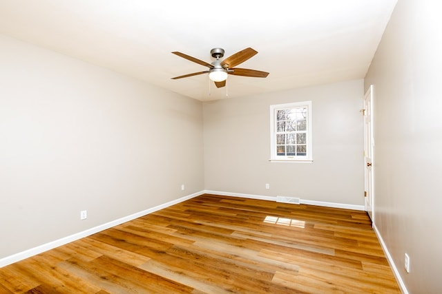 15743 Monticello Dr, Bristol, VA 24202 - spare room with ceiling fan, light wood-type flooring, and baseboards
