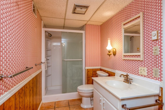 15743 Monticello Dr, Bristol, VA 24202 - bathroom featuring wallpapered walls, a stall shower, vanity, wainscoting, and a paneled ceiling