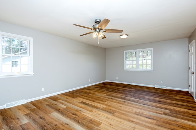 15743 Monticello Dr, Bristol, VA 24202 - spare room with healthy amount of natural light, ceiling fan, and wood finished floors