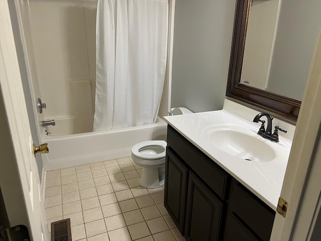 full bathroom featuring shower / tub combo with curtain, vanity, toilet, and tile patterned flooring