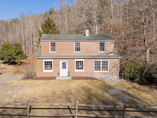 view of front of house with a front lawn