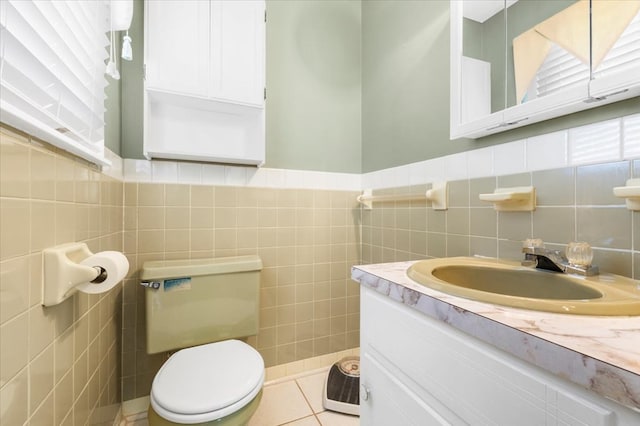 542 Mosswood Ln, Bristol, VA 24201 - half bath with tile walls, vanity, toilet, and wainscoting
