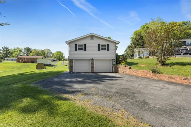 542 Mosswood Ln, Bristol, VA 24201 - view of home's exterior featuring asphalt driveway and an attached garage