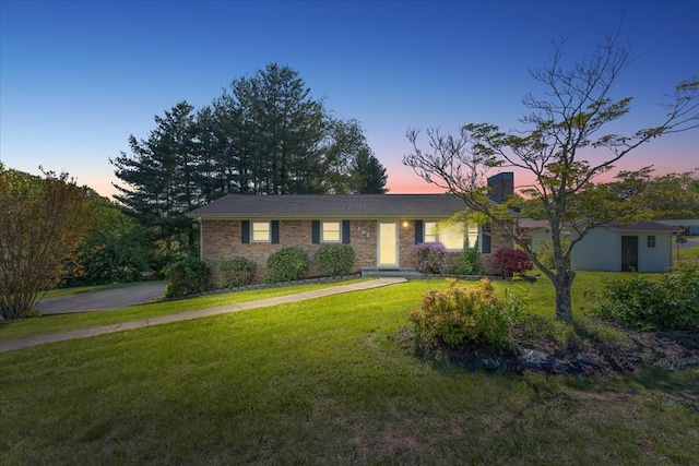 542 Mosswood Ln, Bristol, VA 24201 - single story home with a front yard and brick siding
