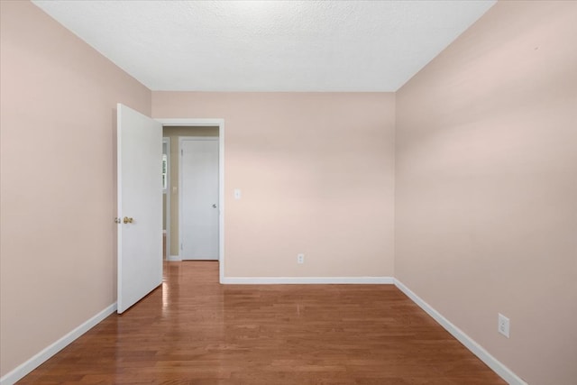 542 Mosswood Ln, Bristol, VA 24201 - spare room featuring wood finished floors and baseboards