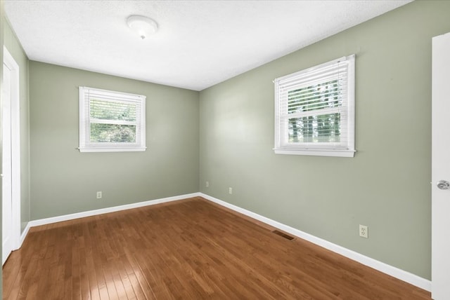 542 Mosswood Ln, Bristol, VA 24201 - unfurnished room with wood finished floors and baseboards