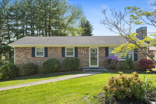 542 Mosswood Ln, Bristol, VA 24201 - ranch-style home featuring brick siding, a front lawn, a chimney, and a shingled roof