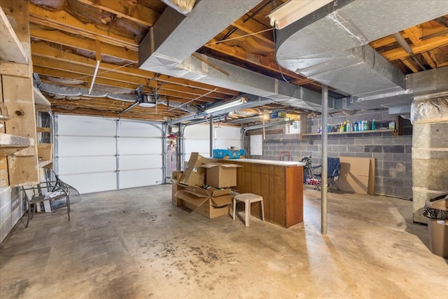 542 Mosswood Ln, Bristol, VA 24201 - garage with a garage door opener and concrete block wall