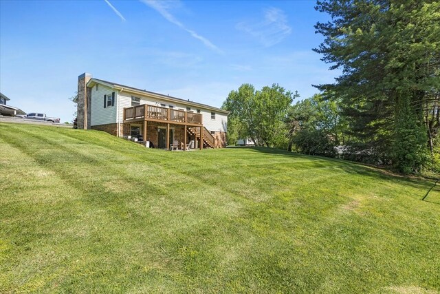 542 Mosswood Ln, Bristol, VA 24201 - rear view of property with stairway, a deck, a chimney, and a yard