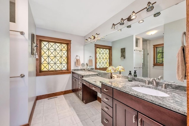 101 Spring Haven Dr, Fancy Gap, VA 24328 - full bath with baseboards, vanity, a shower with shower door, and marble finish flooring