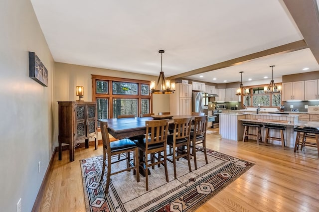 101 Spring Haven Dr, Fancy Gap, VA 24328 - dining area with a chandelier, light wood-type flooring, recessed lighting, and baseboards