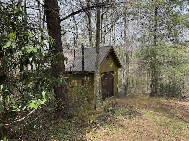 101 Spring Haven Dr, Fancy Gap, VA 24328 - view of outdoor structure with a garage and a view of trees