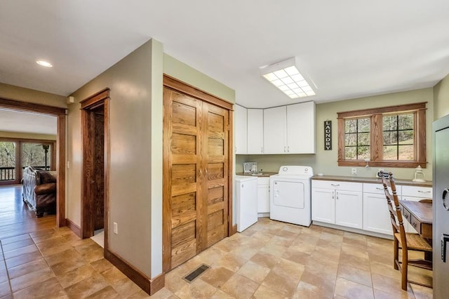 101 Spring Haven Dr, Fancy Gap, VA 24328 - laundry area with washer and dryer and baseboards