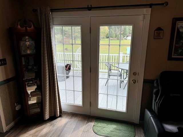 entryway with light wood-style flooring