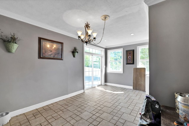 unfurnished room with a notable chandelier, crown molding, a wealth of natural light, and a textured ceiling