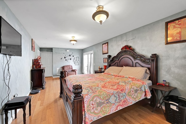 bedroom with light hardwood / wood-style flooring