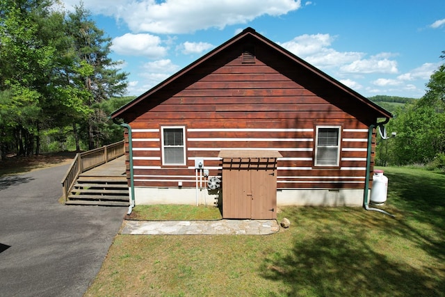 805 Double Bridges Dr, Fancy Gap, VA 24328 - view of home's exterior with a lawn and a wooden deck