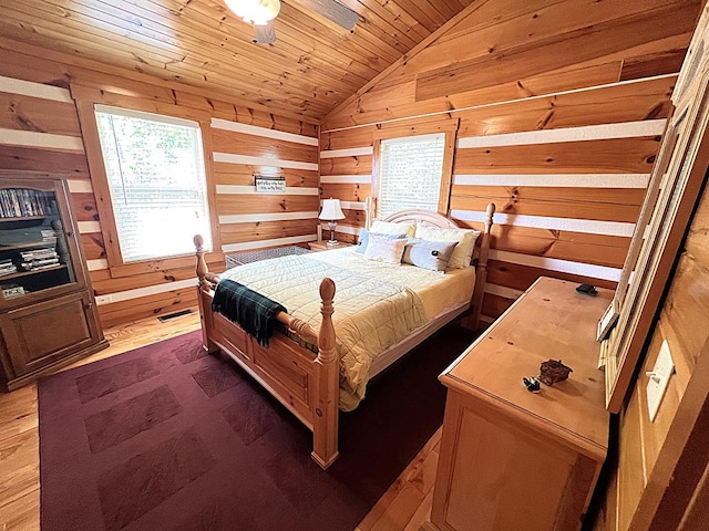 805 Double Bridges Dr, Fancy Gap, VA 24328 - bedroom with lofted ceiling, wood walls, and wood ceiling
