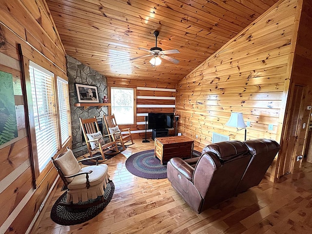 805 Double Bridges Dr, Fancy Gap, VA 24328 - living area featuring vaulted ceiling, hardwood / wood-style flooring, a ceiling fan, wooden ceiling, and wooden walls