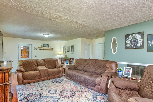 556 Stoney Battery Rd, Marion, VA 24354 - living room with a textured ceiling and wood finished floors