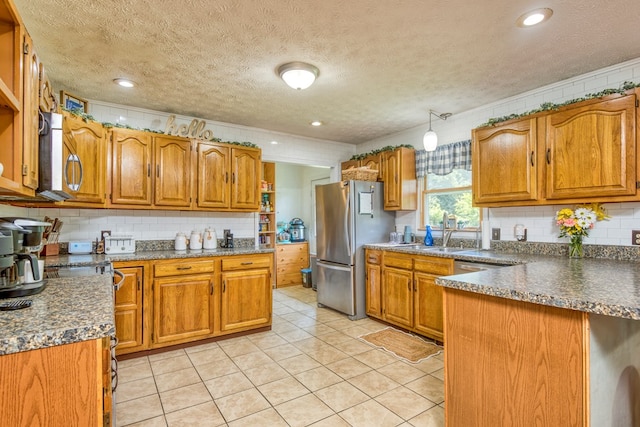 556 Stoney Battery Rd, Marion, VA 24354 - kitchen featuring stainless steel appliances, brown cabinets, backsplash, a textured ceiling, and recessed lighting