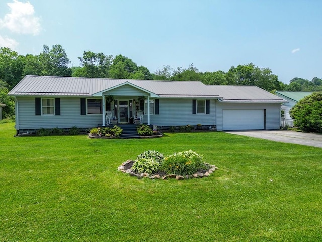 556 Stoney Battery Rd, Marion, VA 24354 - single story home featuring an attached garage, a front yard, driveway, and metal roof