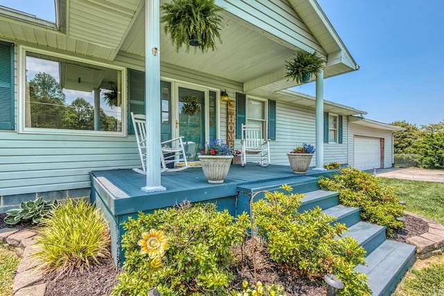 556 Stoney Battery Rd, Marion, VA 24354 - porch featuring an attached garage and driveway