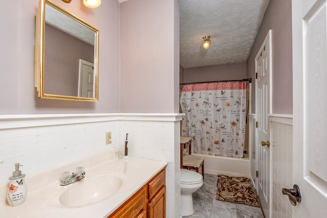 556 Stoney Battery Rd, Marion, VA 24354 - full bathroom with vanity, toilet, a textured ceiling, tile patterned floors, and shower / tub combo