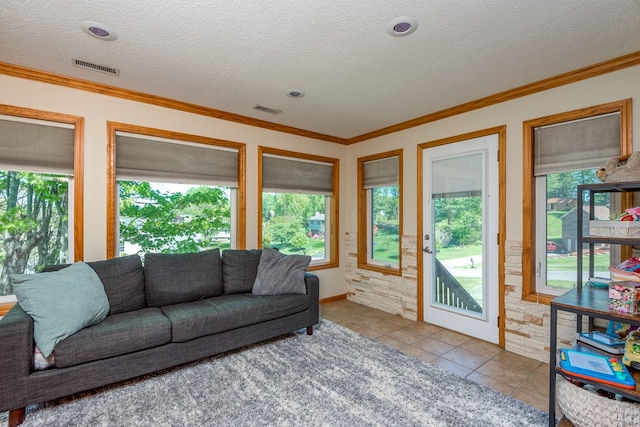 515 Meadowcrest Dr, Bristol, VA 24201 - tiled living area with visible vents, a textured ceiling, and crown molding