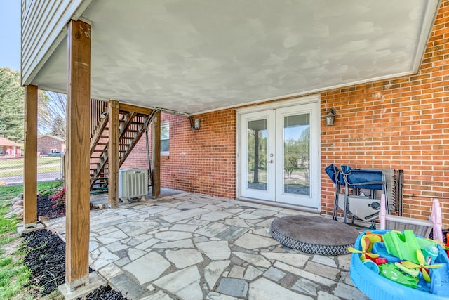 515 Meadowcrest Dr, Bristol, VA 24201 - view of patio featuring stairs, central air condition unit, french doors, and fence