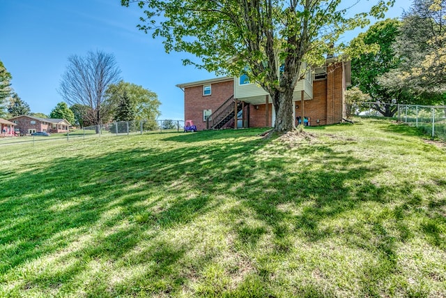 515 Meadowcrest Dr, Bristol, VA 24201 - view of yard featuring stairs and a fenced backyard