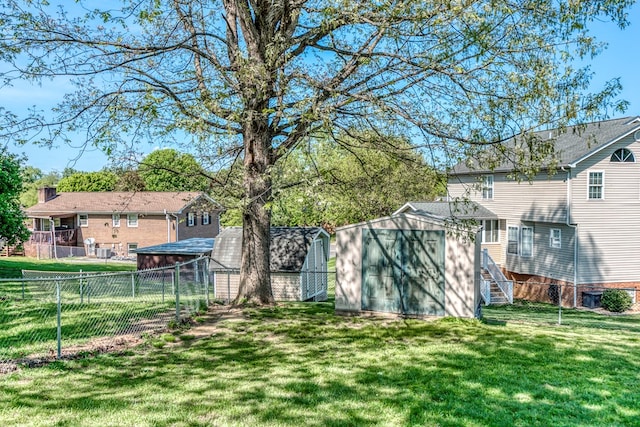 515 Meadowcrest Dr, Bristol, VA 24201 - view of yard featuring a storage shed, fence, and an outdoor structure