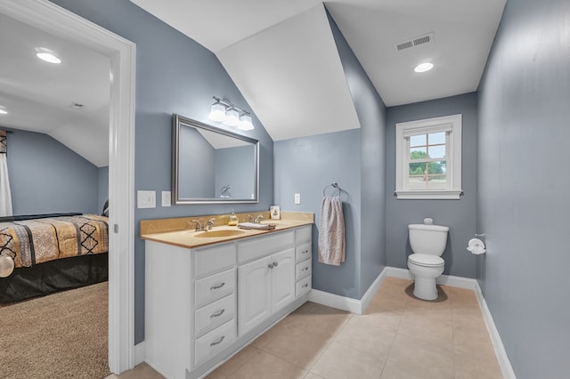 567 Saint James Rd, Chilhowie, VA 24319 - bathroom featuring ensuite bath, double vanity, lofted ceiling, tile patterned floors, and baseboards