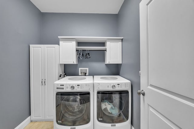 567 Saint James Rd, Chilhowie, VA 24319 - washroom with washer and clothes dryer, cabinet space, and baseboards