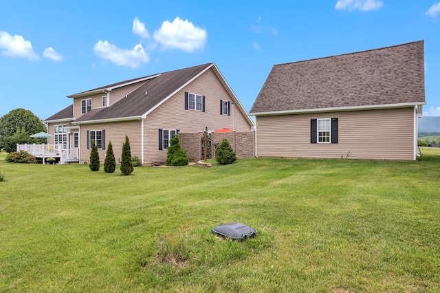 567 Saint James Rd, Chilhowie, VA 24319 - back of property featuring a lawn, a deck, and a shingled roof