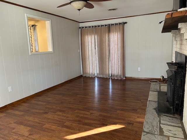 living room featuring ceiling fan, ornamental molding, and dark hardwood / wood-style flooring