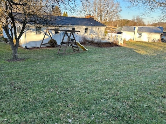 view of yard featuring a deck