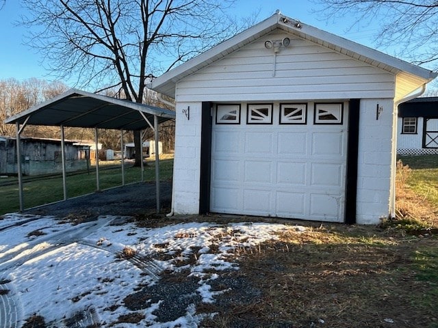 garage with a carport