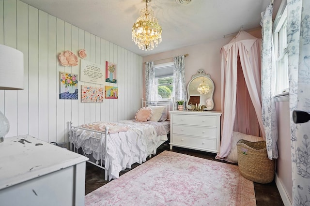 16050 Industrial Park Rd, Bristol, VA 24202 - bedroom featuring a chandelier and wood walls