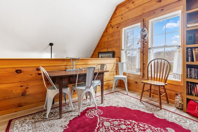 799 Crystal Springs Dr, Fancy Gap, VA 24328 - office with vaulted ceiling, wooden walls, and wood finished floors