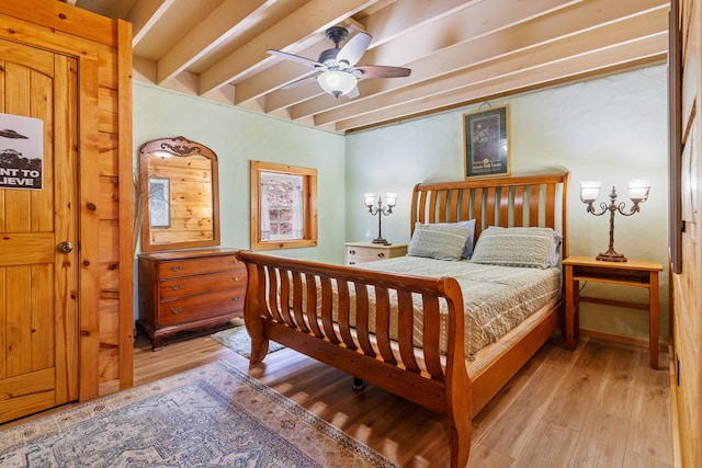 799 Crystal Springs Dr, Fancy Gap, VA 24328 - bedroom featuring light wood-type flooring, beamed ceiling, and a ceiling fan