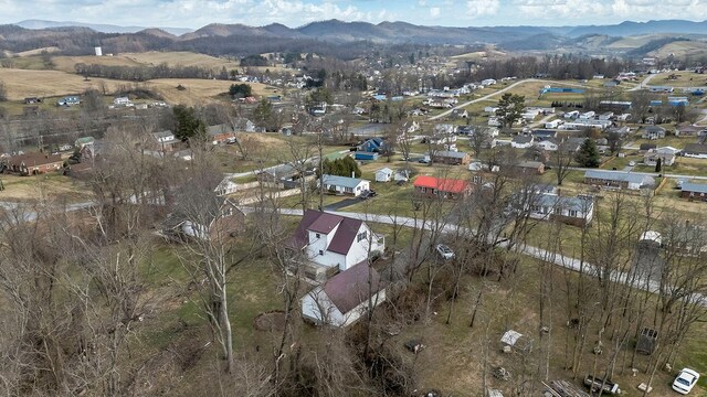 drone / aerial view featuring a mountain view