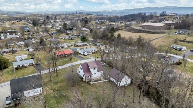 aerial view with a mountain view and a residential view