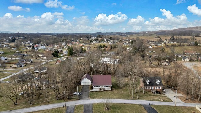 drone / aerial view with a residential view and a mountain view